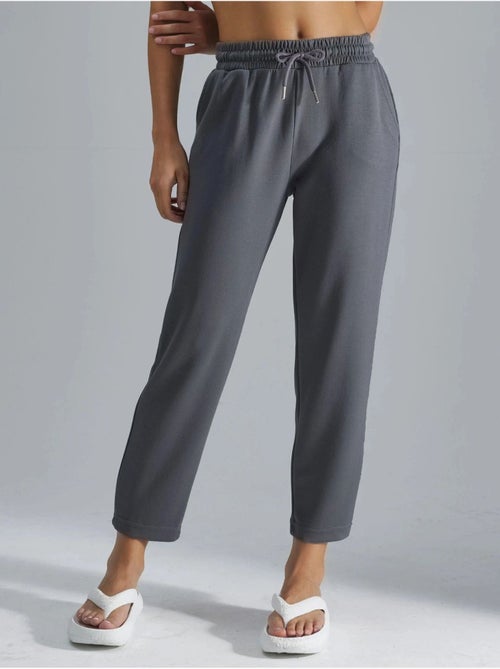 Pantaloni jogger carrot fit con vita elasticizzata effetto modal, hiccup - Kiabi Pantaloni jogger carrot fit con vita elasticizzata effetto modal, hiccup - Kiabi