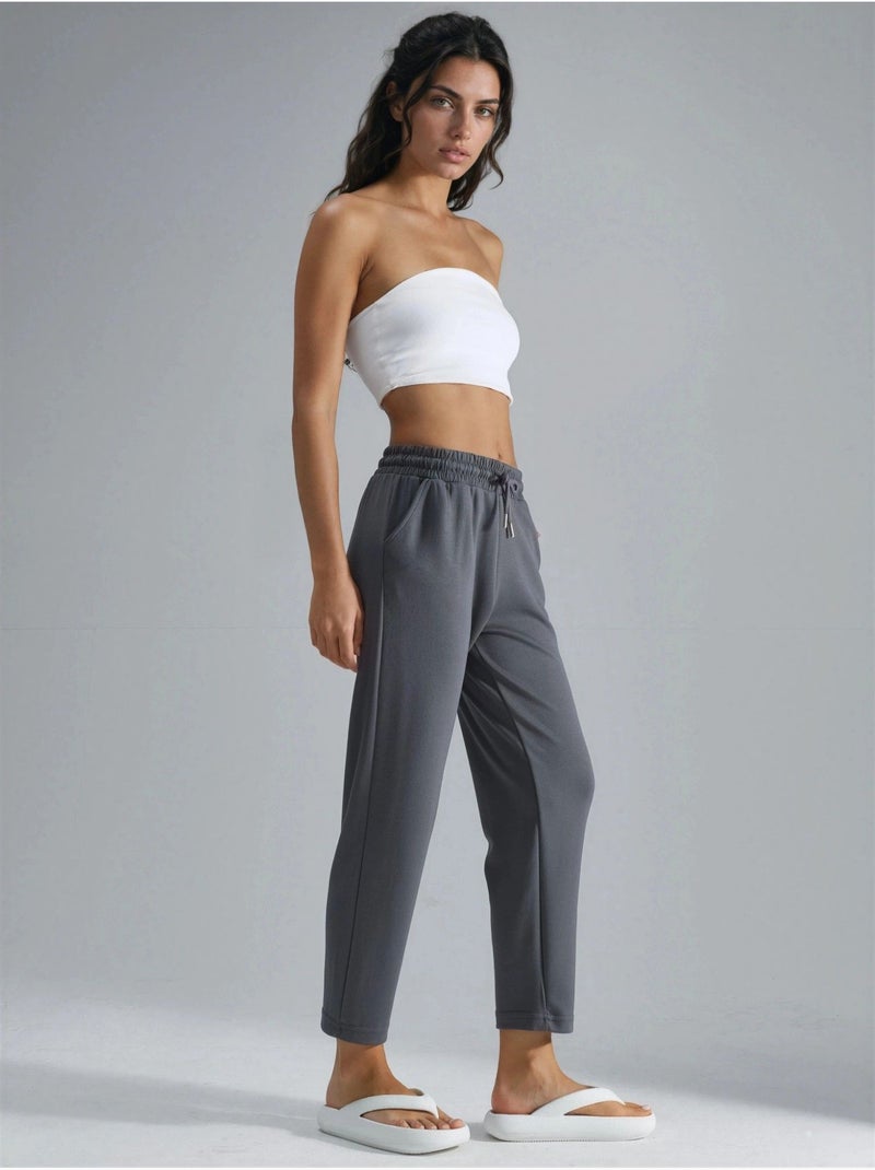 Pantaloni jogger carrot fit con vita elasticizzata effetto modal, hiccup Grigio - Kiabi