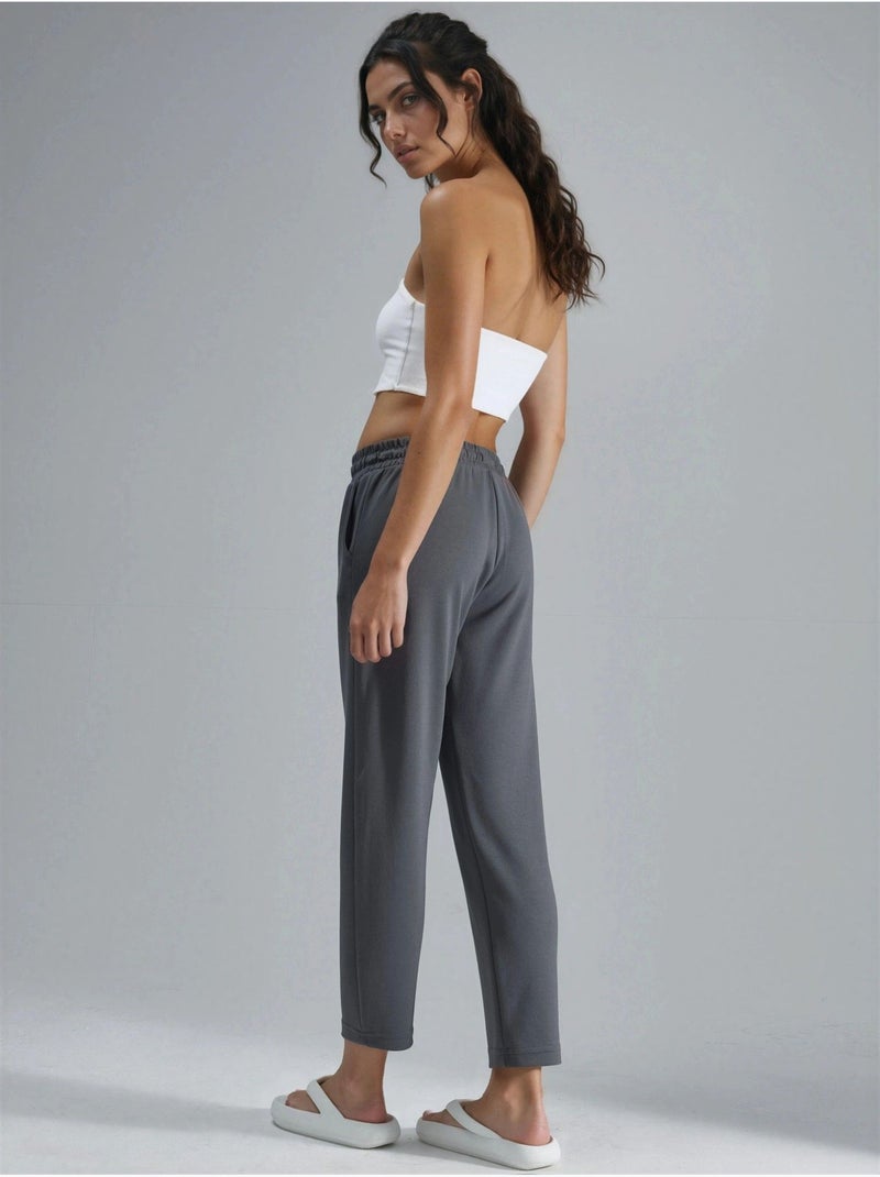 Pantaloni jogger carrot fit con vita elasticizzata effetto modal, hiccup Grigio - Kiabi