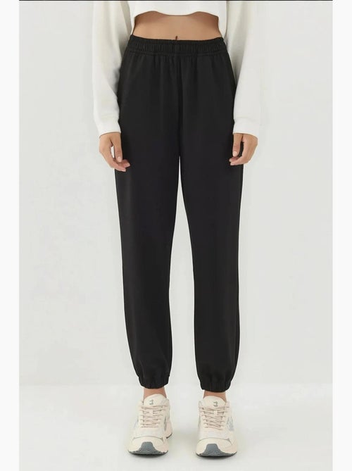 Pantaloni jogger con vita elastica e tocco modal hiccup - Kiabi Pantaloni jogger con vita elastica e tocco modal hiccup - Kiabi