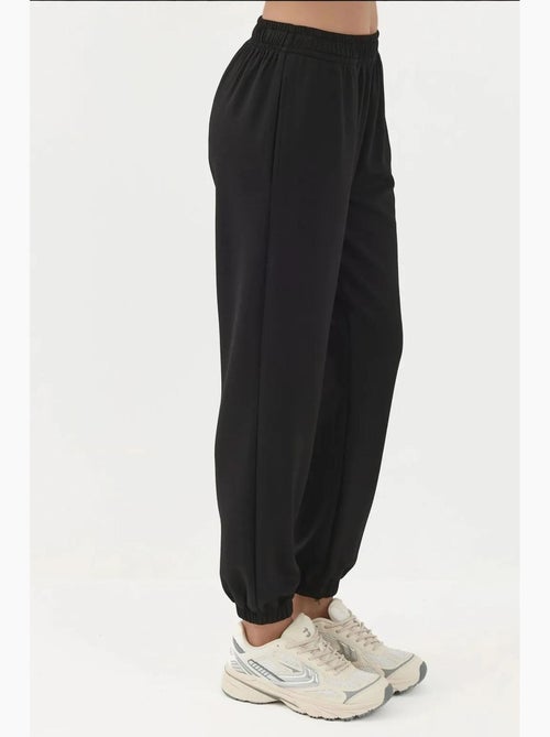 Pantaloni jogger con vita elastica e tocco modal hiccup - Kiabi Pantaloni jogger con vita elastica e tocco modal hiccup - Kiabi