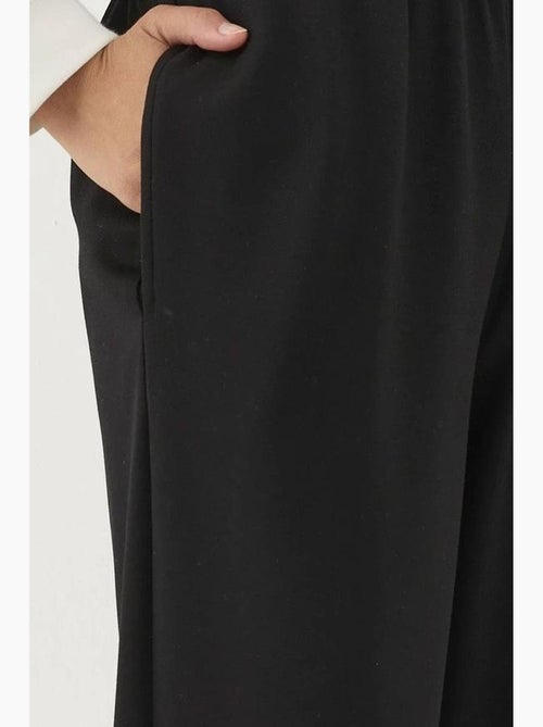 Pantaloni jogger con vita elastica e tocco modal hiccup - Kiabi Pantaloni jogger con vita elastica e tocco modal hiccup - Kiabi