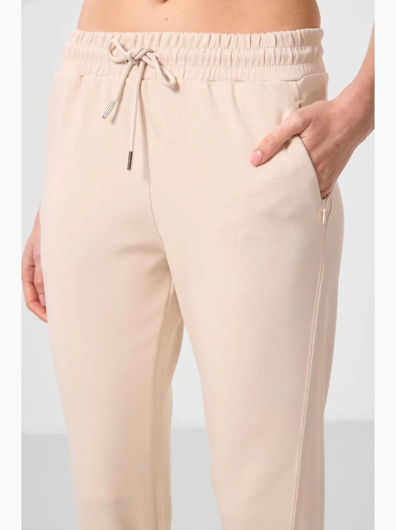 Pantaloni jogger da donna con zip tommy Beige argilla - Kiabi