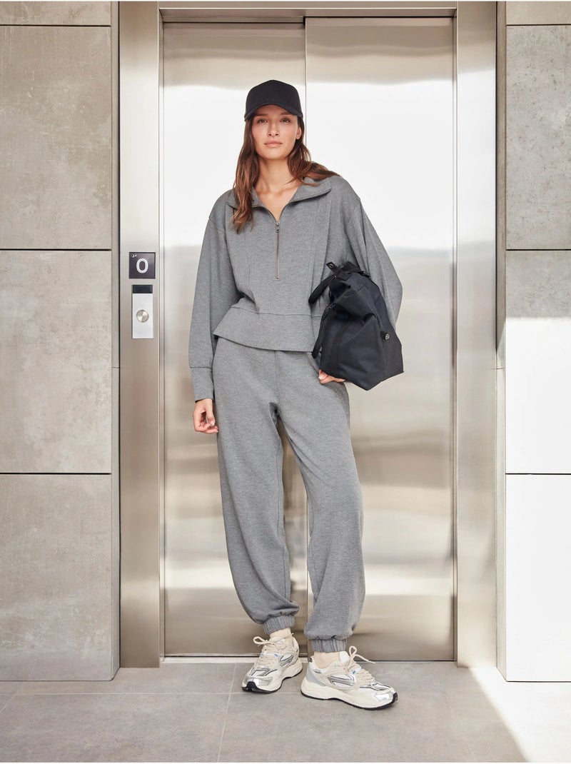 Pantaloni jogger felpati Grigio melangiato - Kiabi