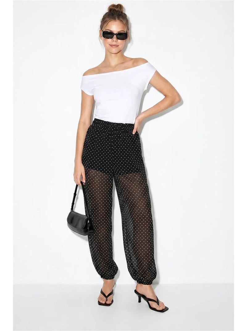 Pantaloni jogger in chiffon a pois lucci Nero - Kiabi