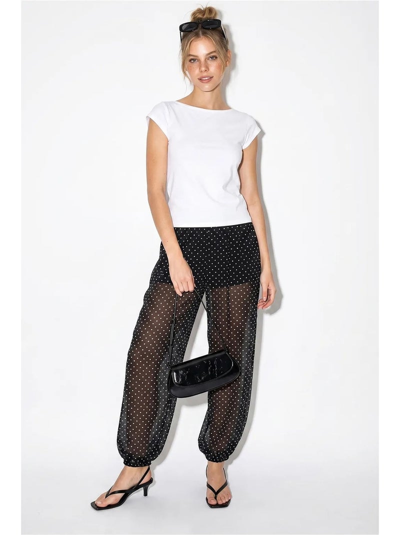 Pantaloni jogger in chiffon a pois lucci Nero - Kiabi