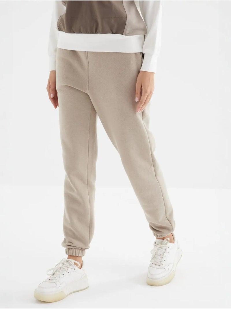 Pantaloni jogger in felpa in pile a vita alta da donna tommy Beige argilla - Kiabi