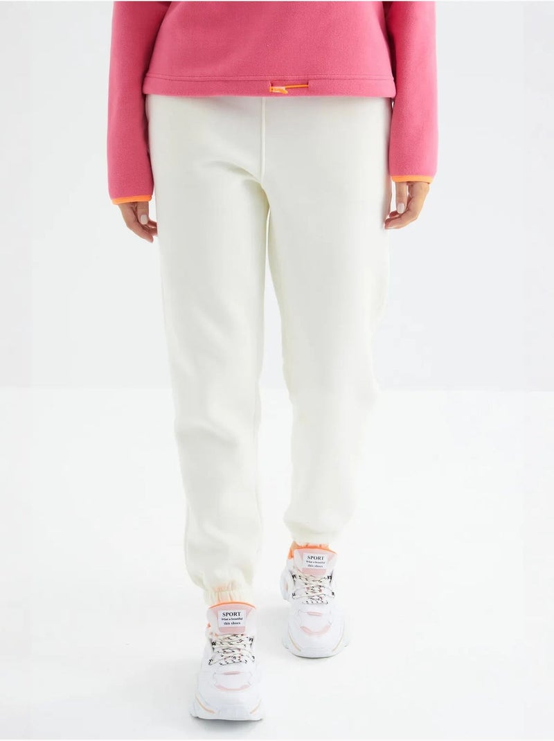 Pantaloni jogger in felpa in pile a vita alta da donna tommy Bianco sporco - Kiabi