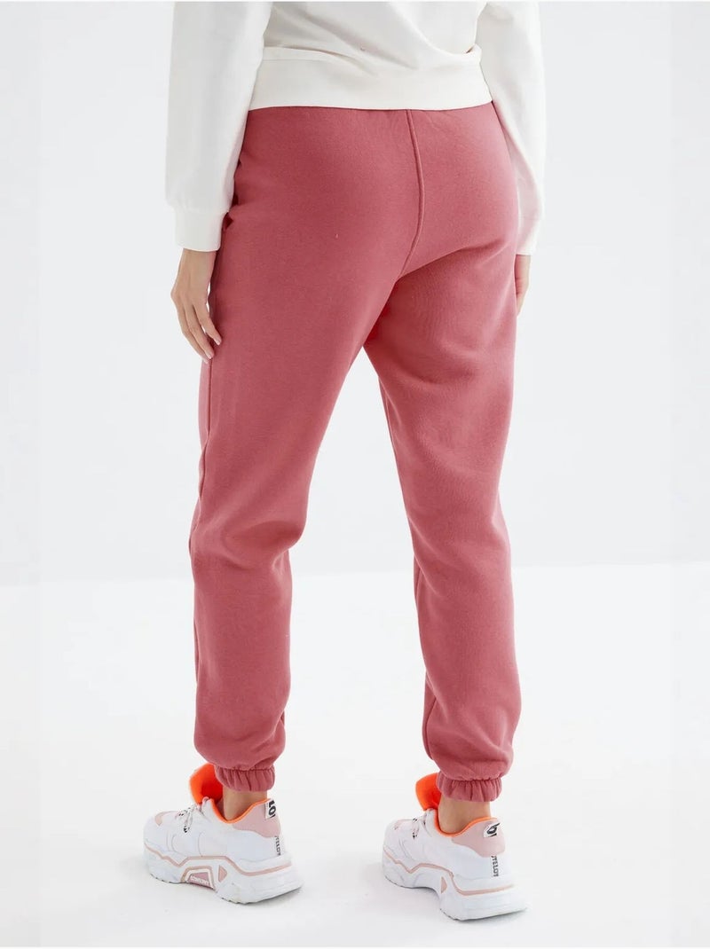 Pantaloni jogger in felpa in pile a vita alta da donna tommy Rosa antico - Kiabi