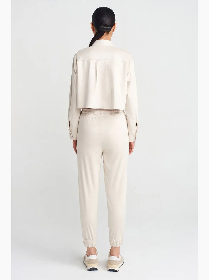 Pantaloni jogger in finta pelle scamosciata dilvin Crema - Kiabi