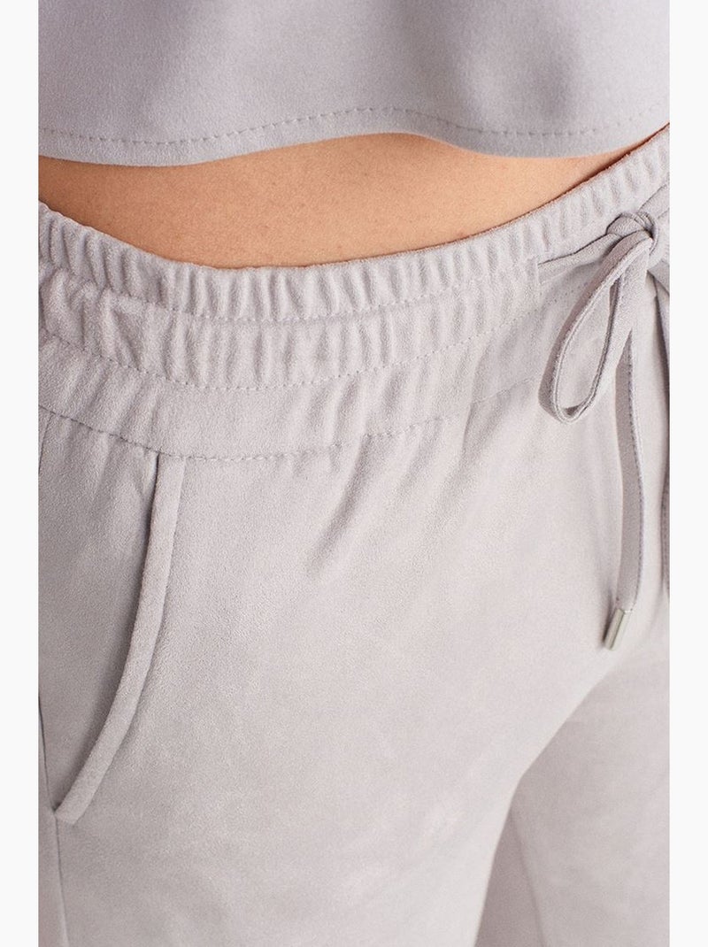 Pantaloni jogger in finta pelle scamosciata dilvin Grigio chiaro - Kiabi
