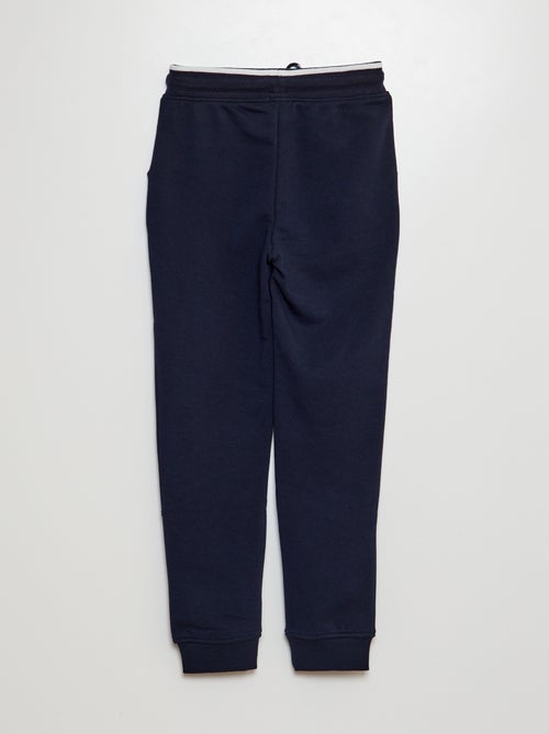 Pantaloni joggers in tessuto felpato - Kiabi