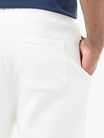 Pantaloni joggers tinta unita con cordoncini da stringere in vita