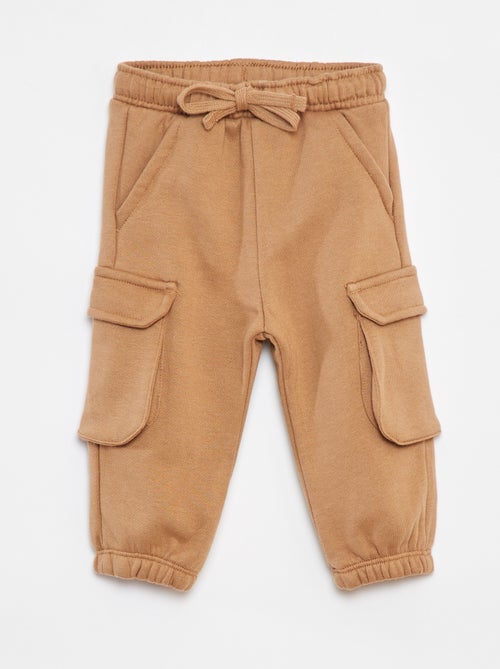 Pantaloni joggers tinta unita con tasche grandi - Kiabi