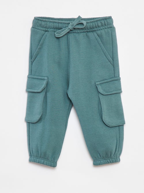 Pantaloni joggers tinta unita con tasche grandi - Kiabi