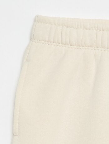 Pantaloni jogging ampi