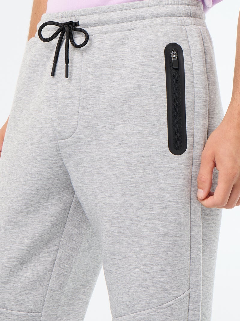 Pantaloni jogging con tasche con zip Grigio - Kiabi