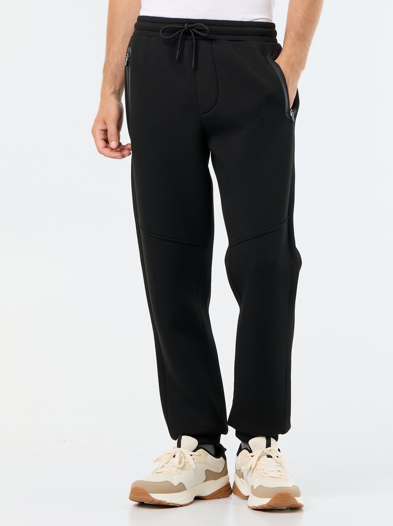 Pantaloni jogging con tasche con zip Nero - Kiabi