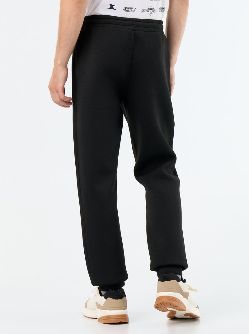 Pantaloni jogging con tasche con zip Nero - Kiabi