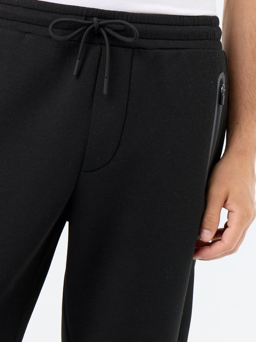 Pantaloni jogging con tasche con zip - Kiabi Pantaloni jogging con tasche con zip - Kiabi