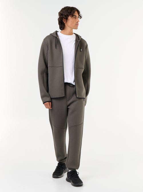 Pantaloni jogging con tasche zippate - Kiabi