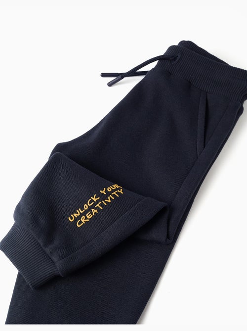 Pantaloni jogging in cotone con stampa creativity - Kiabi