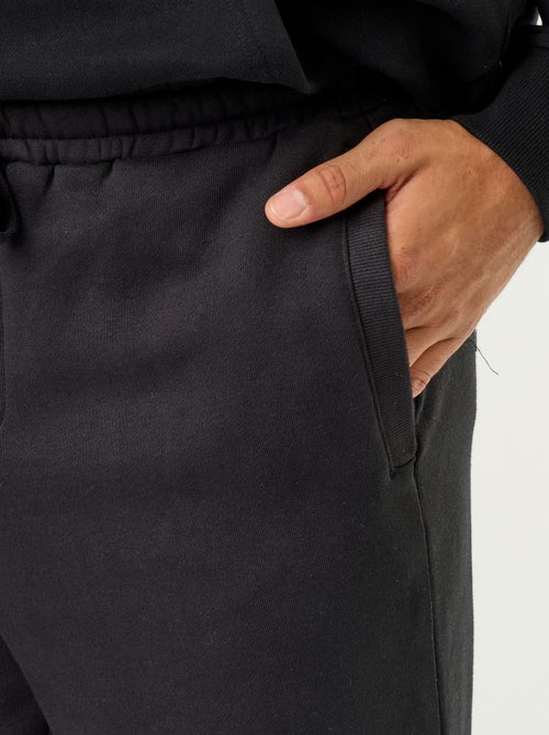 Pantaloni jogging in felpa tinta unita - Kiabi