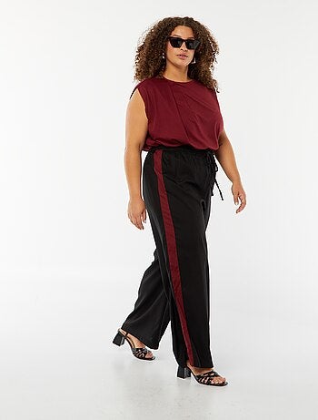 Pantaloni larghi con bande a contrasto