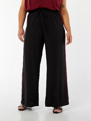 Pantaloni larghi con bande a contrasto