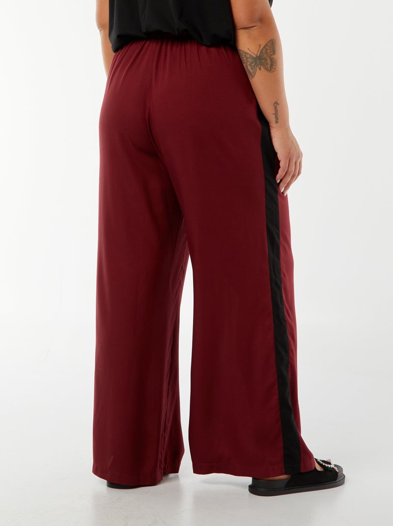 Pantaloni larghi con bande a contrasto Rosso - Kiabi
