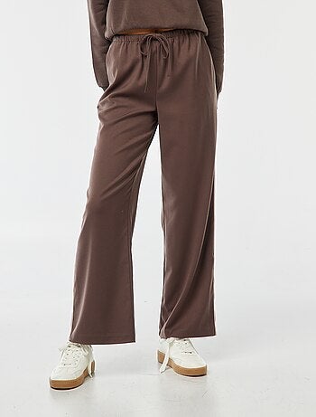 Pantaloni larghi con bordino sul lato