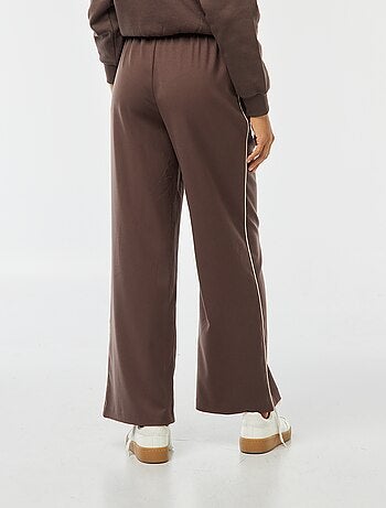 Pantaloni larghi con bordino sul lato