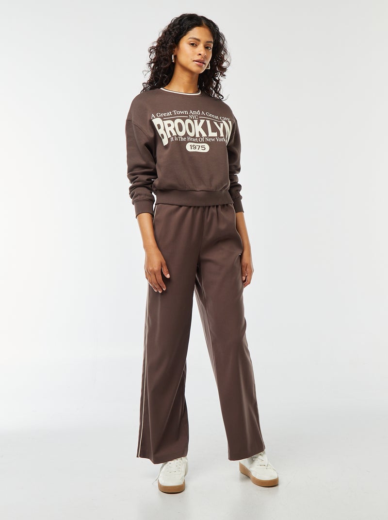 Pantaloni larghi con bordino sul lato Marrone - Kiabi