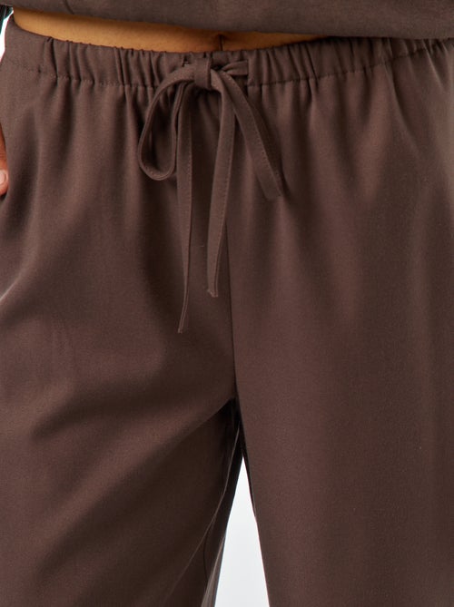 Pantaloni larghi con bordino sul lato - Kiabi