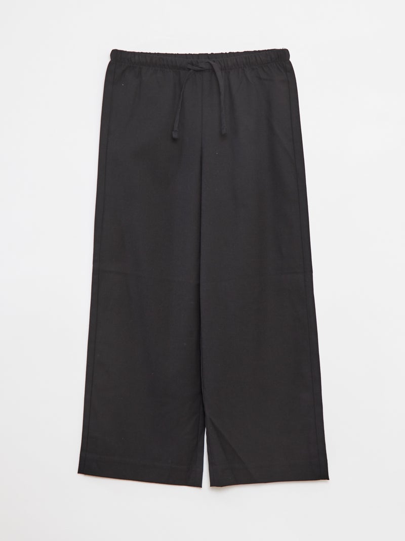 Pantaloni larghi con cintura elasticizzata e 2 tasche nero - Kiabi