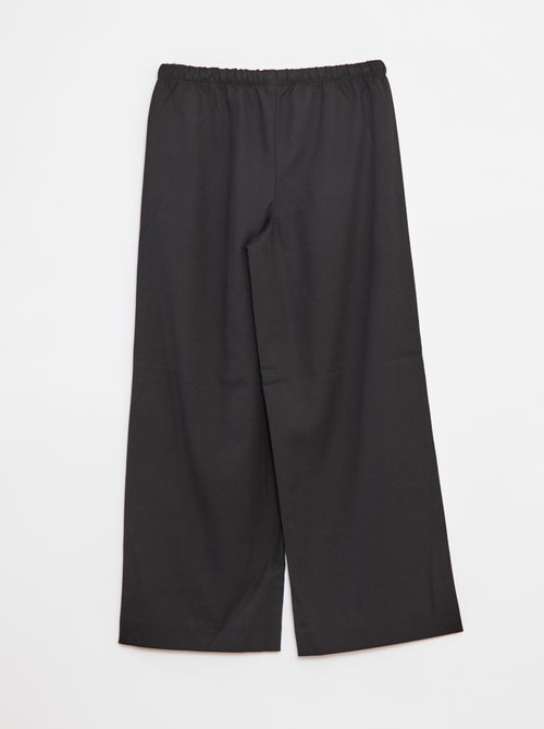 Pantaloni larghi con cintura elasticizzata e 2 tasche - Kiabi