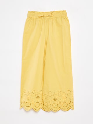 Pantaloni larghi con ricami a punto inglese