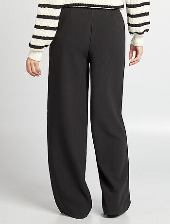 Pantaloni larghi con vita elasticizzata e cordoncini da stringere