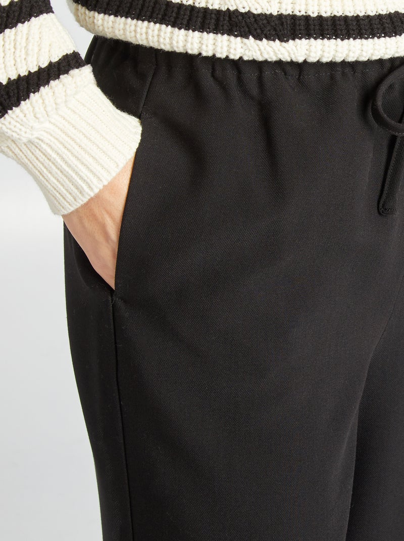 Pantaloni larghi con vita elasticizzata e cordoncini da stringere nero - Kiabi