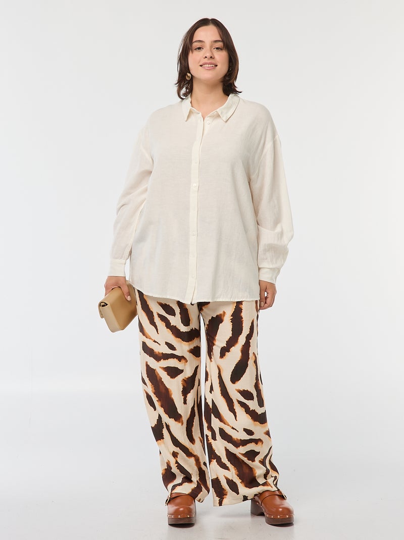 Pantaloni larghi e morbidi con motivo all over Beige Taglie