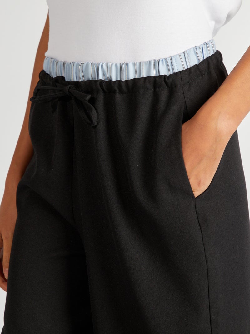 Pantaloni larghi effetto boxer in vista nero - Kiabi