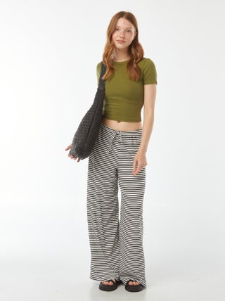 Pantaloni larghi in maglia a righe