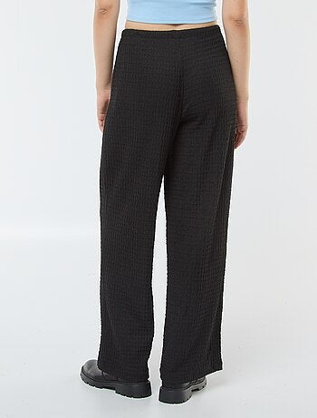 Pantaloni larghi in maglia crêpe