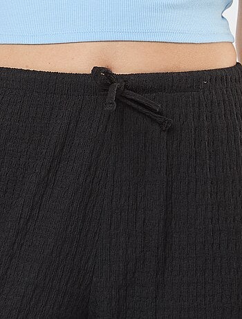 Pantaloni larghi in maglia crêpe