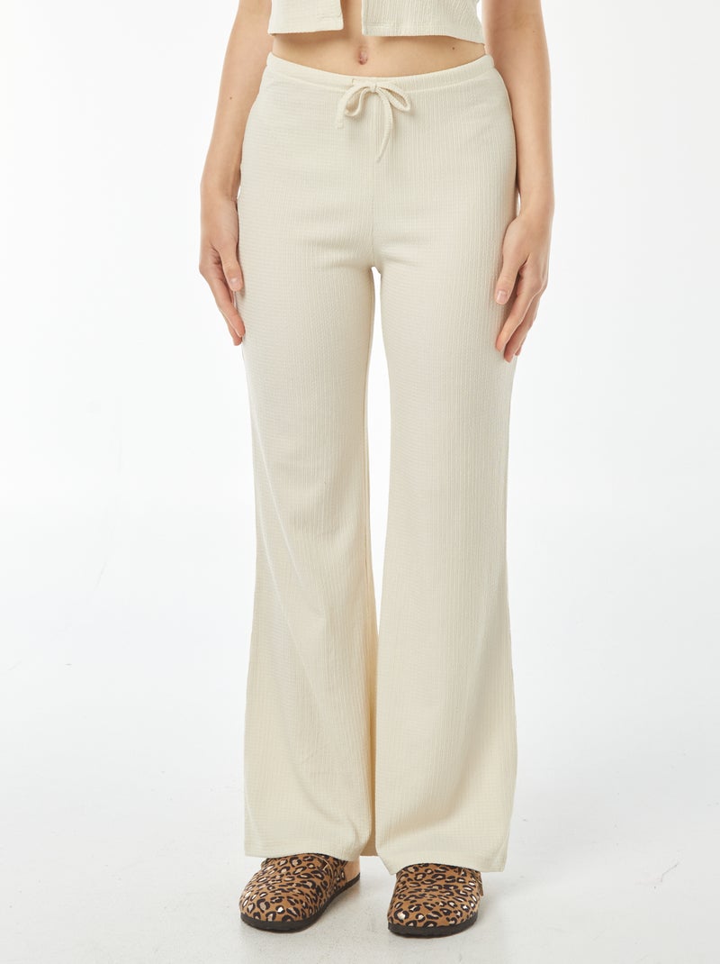 Pantaloni larghi in maglia leggera goffrata beige - Kiabi