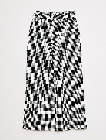 Pantaloni larghi in maglia punto milano con cintura da annodare -