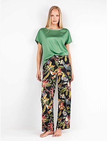 Pantaloni larghi in satin con stampa tropicale sofisticata