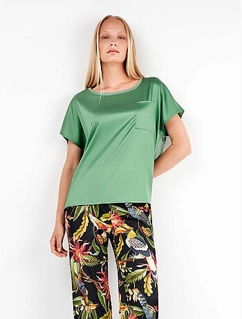 Pantaloni larghi in satin con stampa tropicale sofisticata