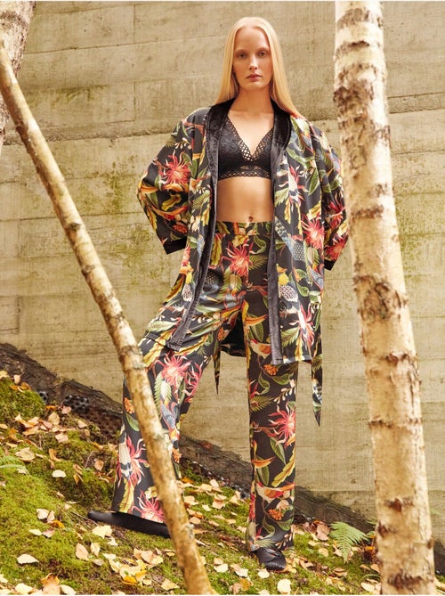 Pantaloni larghi in satin con stampa tropicale sofisticata - Kiabi