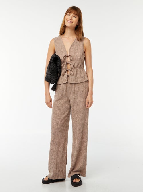 Pantaloni larghi in tessuto goffrato - Kiabi